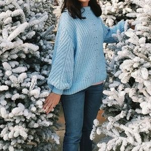 Light blue sweater